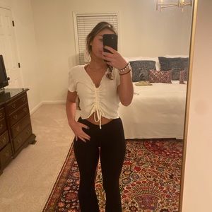 A cute white tie up T-shirt— cute&& casual